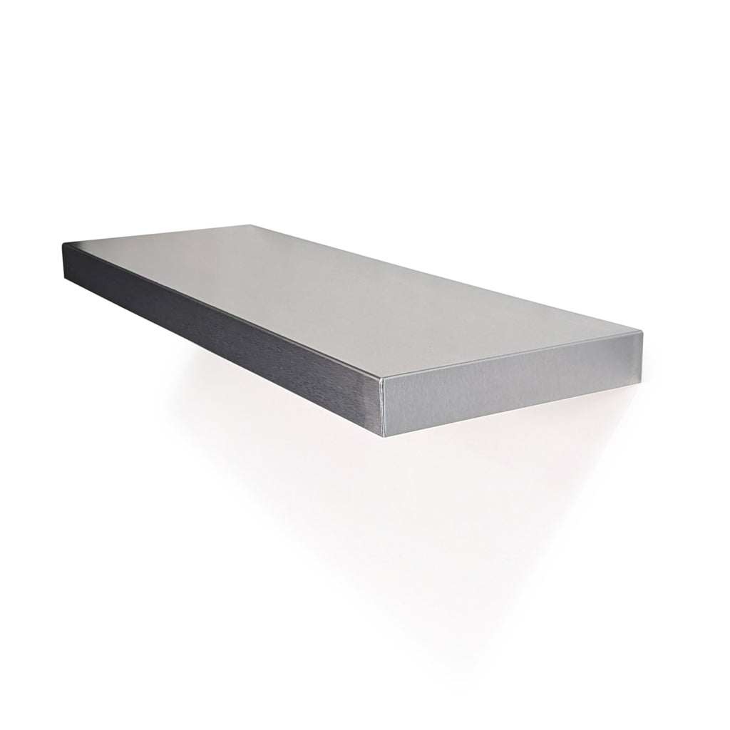 Perspective top view of a custom-length stainless steel floating shelf by Fig & Forge, showing the seamless brushed metal finish and thick-profile for strong design