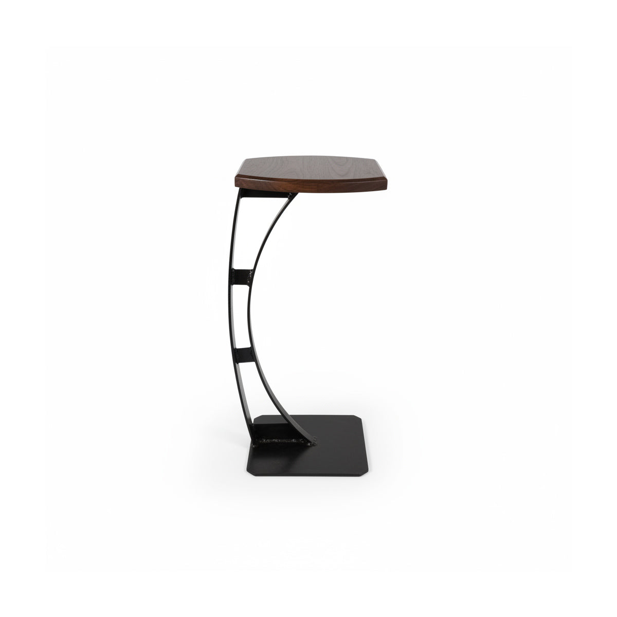 Custom handcrafted C-shaped cantilever table by Fig & Forge featuring a solid American Walnut top on a heavy-duty black carbon steel frame