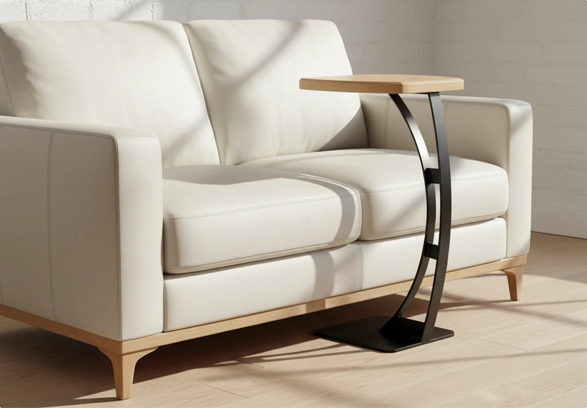 Custom made-to-measure C-shaped side table by Fig & Forge paired with a white sofa, demonstrating the slim, space-saving architectural design