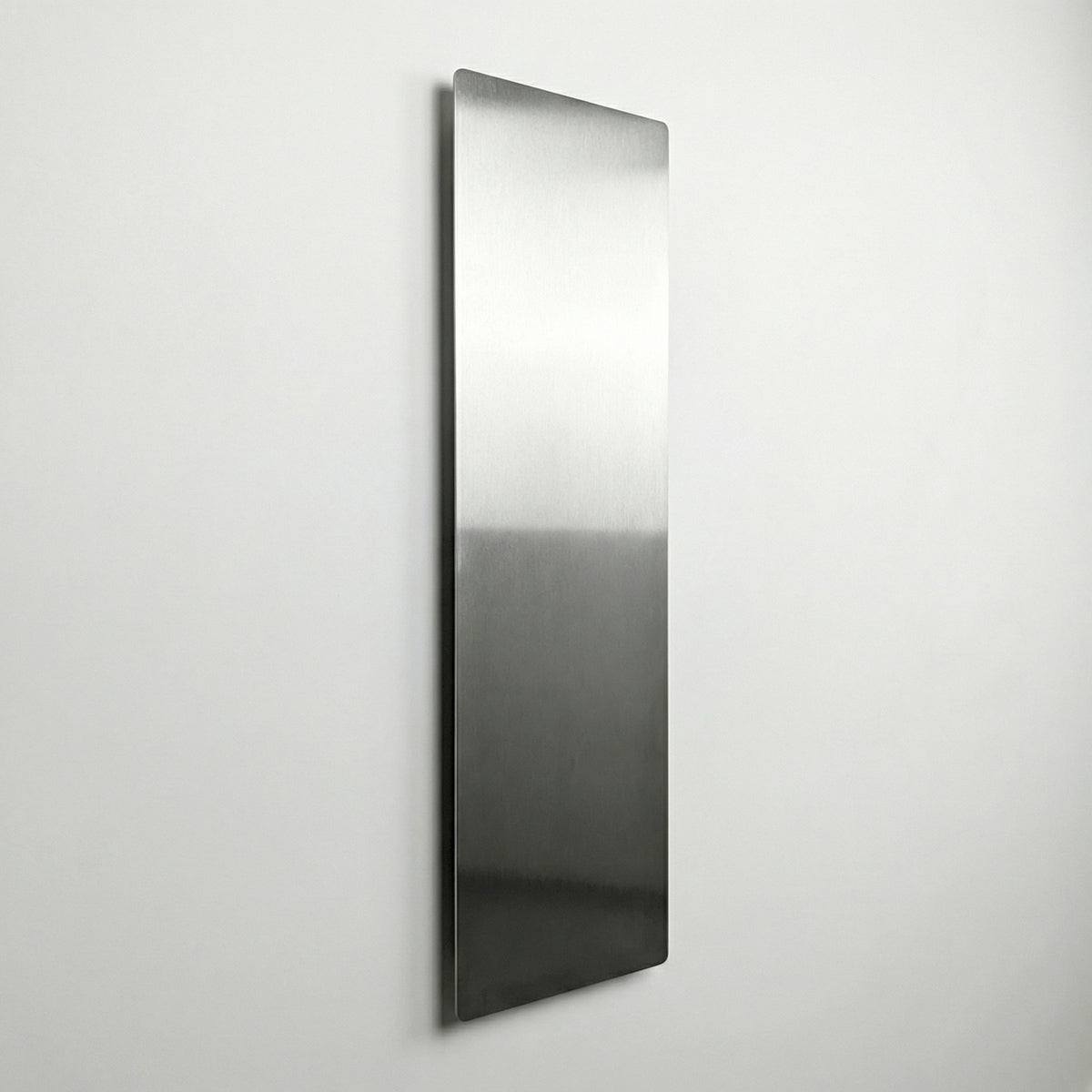 Vertical profile of a custom-sized stainless steel magnetic board by Fig & Forge, featuring a floating wall mount and a high-end brushed metal finish