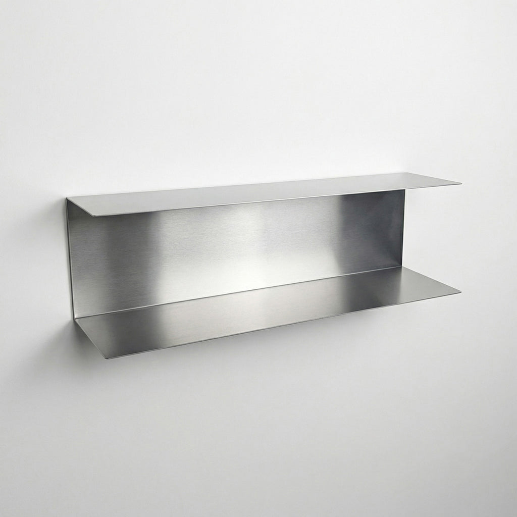 Bespoke dual-level stainless steel wall shelf by Fig & Forge, showing the deep-set design for maximizing vertical storage in modern interiors