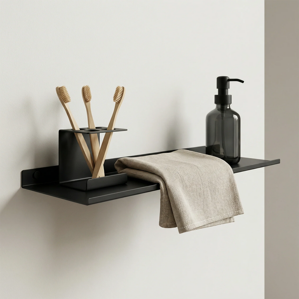 Minimalist matte black floating wall shelf by Fig & Forge providing sleek, rust-resistant bathroom storage
