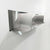 Side-angle view of a heavy-duty stainless steel divider floating shelf by Fig & Forge, highlighting the seamless industrial finish and low-profile wall mounting