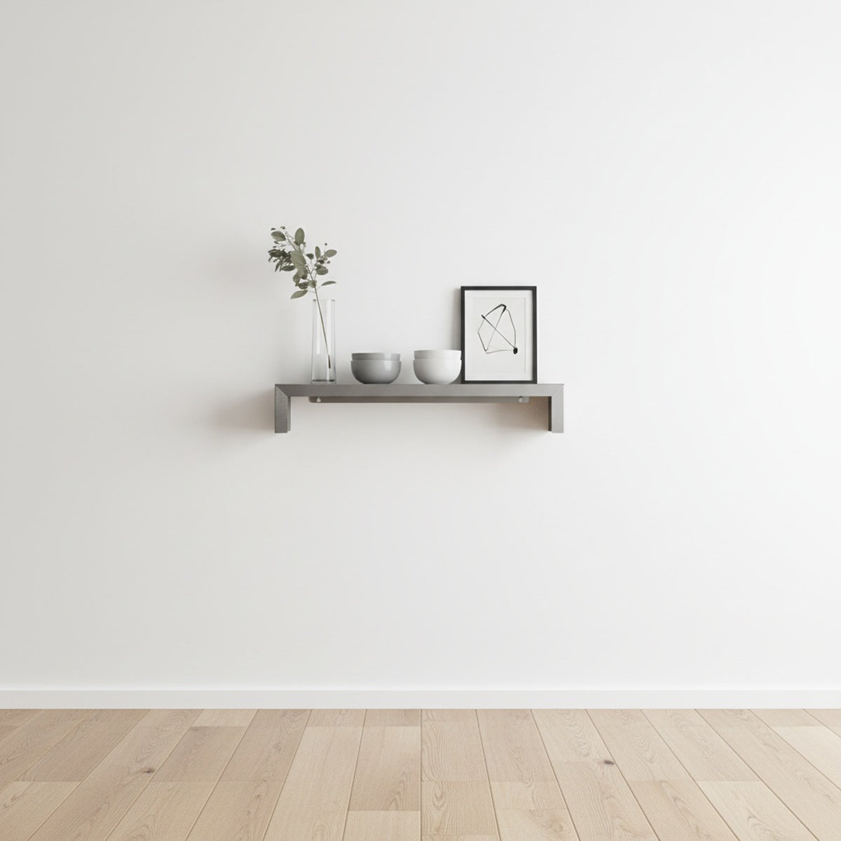 SmartSpan custom-width stainless steel shelf by Fig & Forge installed in a minimalist living room, styled with neutral decor for an architectural look