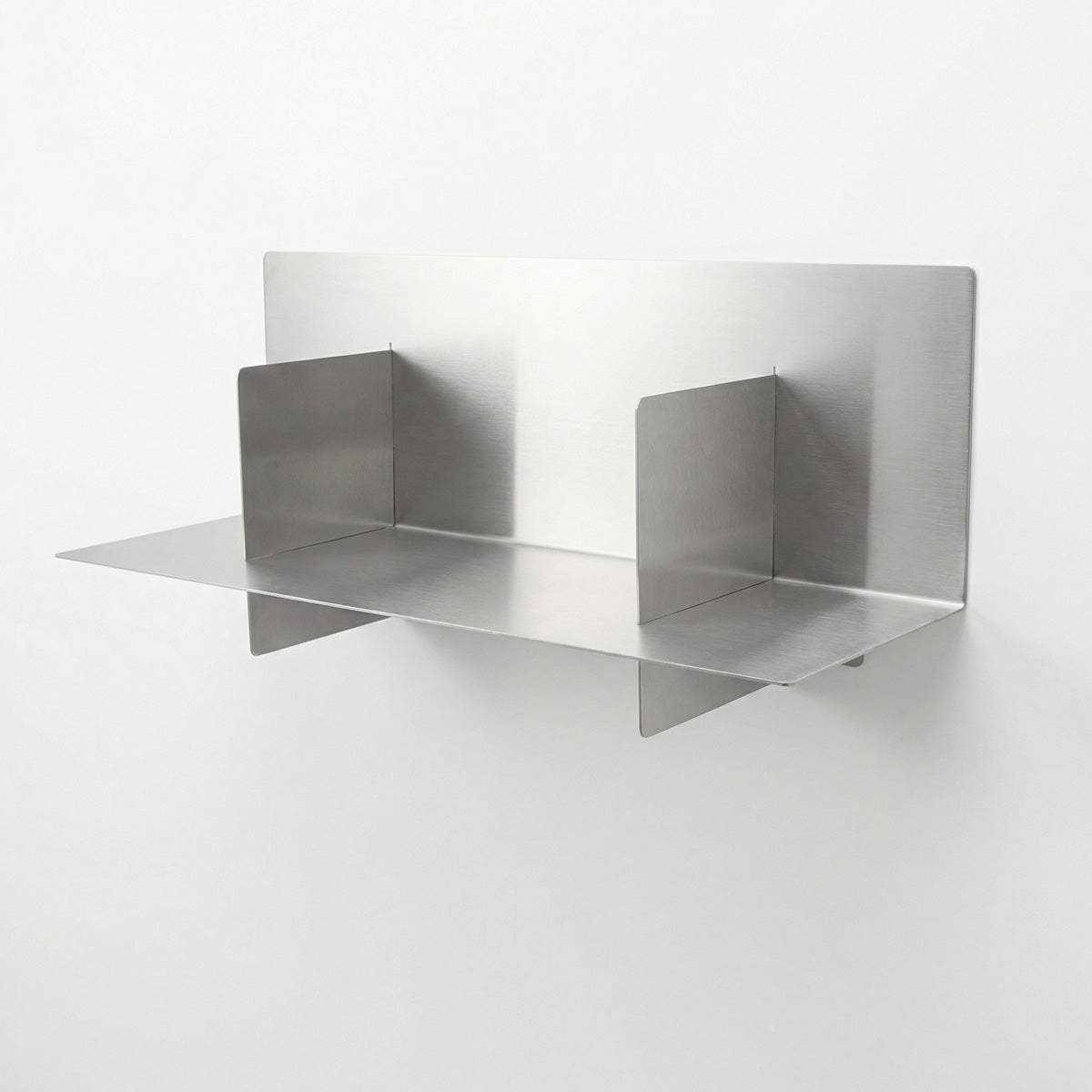 Bespoke Axis stainless steel floating shelf by Fig & Forge, highlighting the seamless structural joints and architectural-grade brushed metal construction