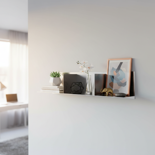 Designer-finish stainless steel divider shelf by Fig & Forge, styled with minimalist ceramics and framed art to show the versatile gallery-style display options