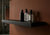 Bespoke heavy-duty floating wall shelf by Fig & Forge in a premium powder-coated matte black finish, designed for easy organization and modern decor
