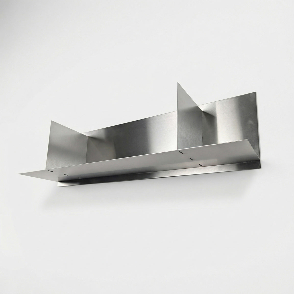 Upward perspective of a made-to-measure stainless steel divider shelf by Fig & Forge, showing the pre-drilled mounting holes for a secure, ready-to-hang installation
